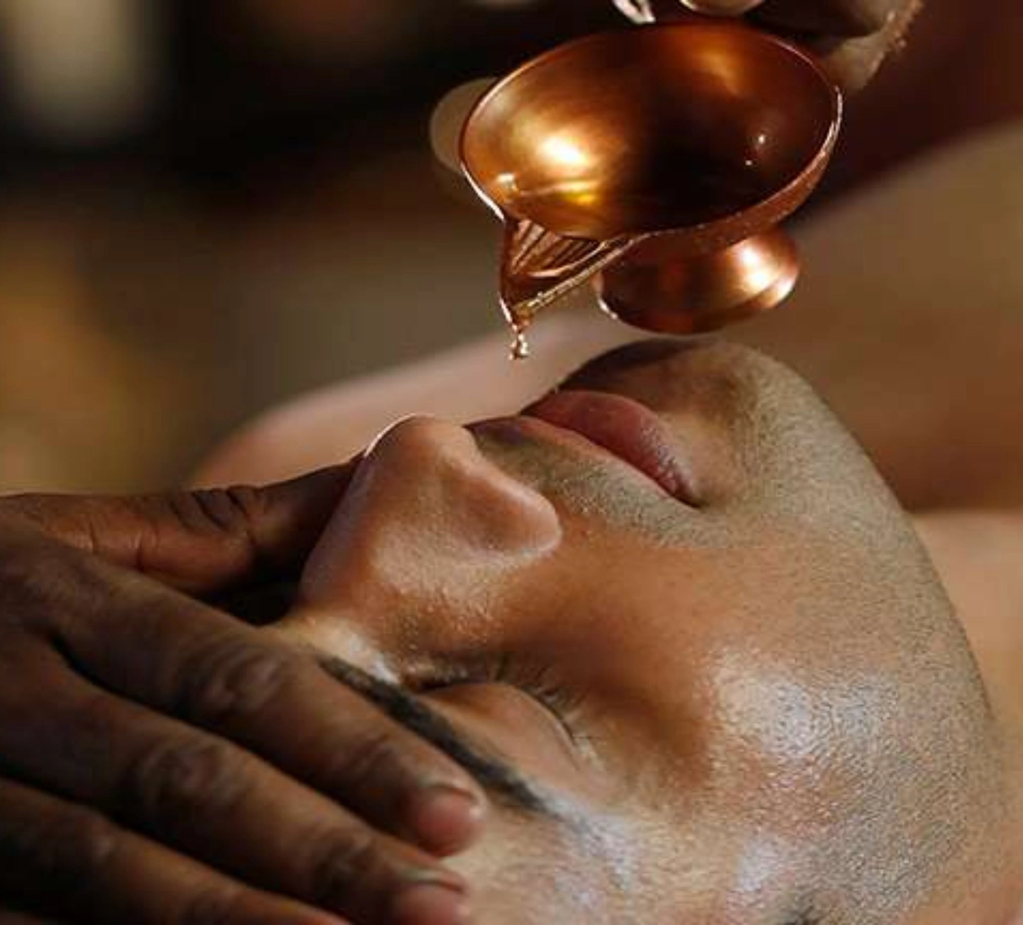Ayurvedic Nasya therapy with herbal oil application through nostril